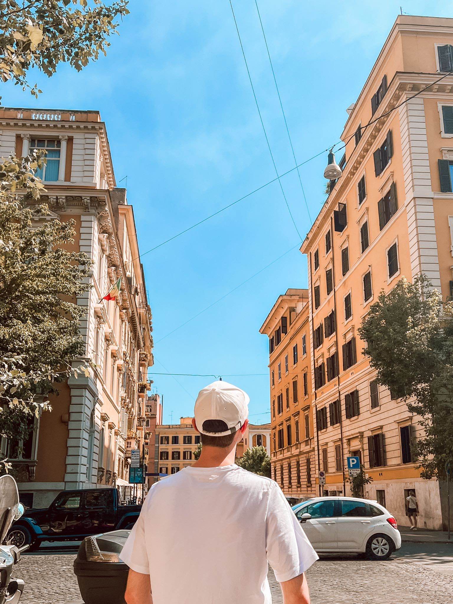 Person walking through buildings